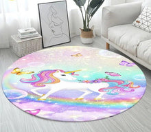 Colourful unicorn 3D cartoon round rug creating a soft non-slip play space for children in a family living area.