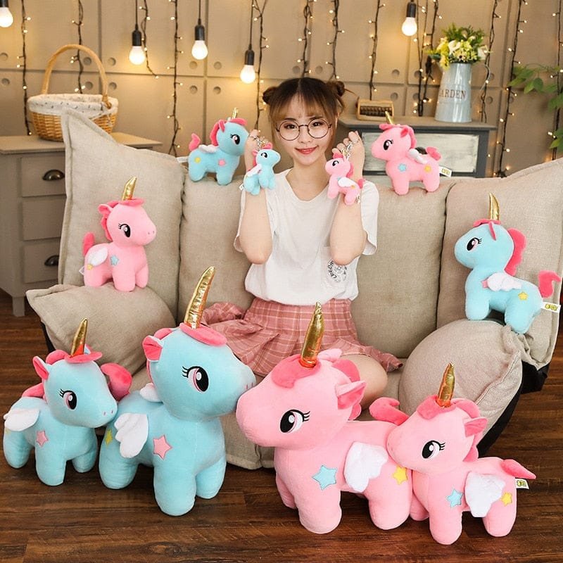 Colourful unicorn plush key bag collection for gifting, backpack charms, and everyday small item storage.