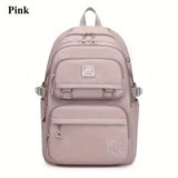 Pink backpack with visible branding 