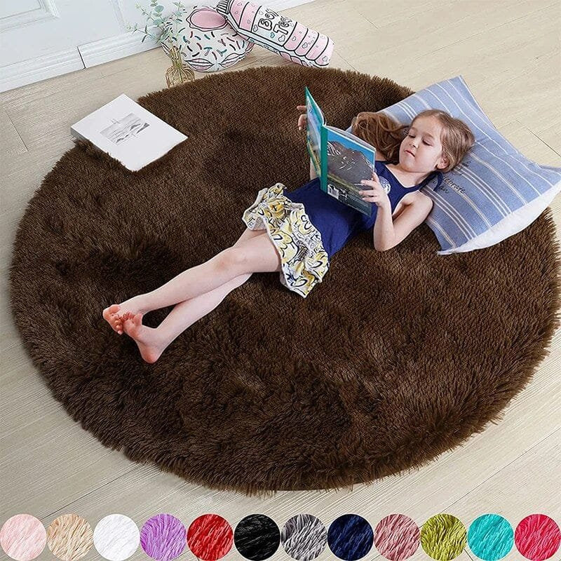 Child lying on a brown round rug reading a book, with color swatches below.