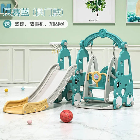 Children's playground set with slide and arch in a room with light green walls.