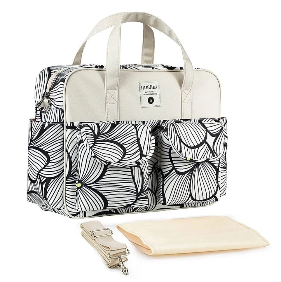 Floral print Waterproof Diaper Bag with convertible carry straps for wearing as a handbag or backpack during baby outings.