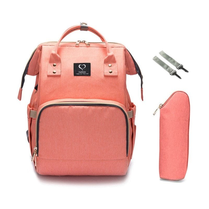 Coral waterproof nursing diaper backpack with matching pouch, a roomy travel bag for baby bottles, wipes, and spare outfits.