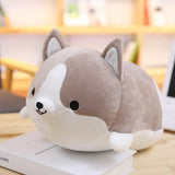 Plush toy dog-shaped pillow.