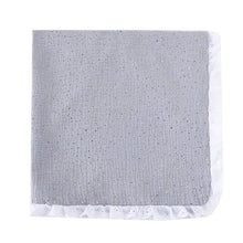 Super Soft Cotton Gauze Muslin Swaddle and Bath Towel, gray textured blanket with white trim, for newborn swaddling, bath time, and stroller outings.