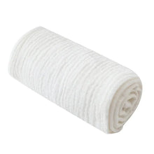 Super Soft Cotton Gauze Muslin Swaddle and Bath Towel, rolled-up white towel, for newborn swaddling, bath time, and stroller outings.