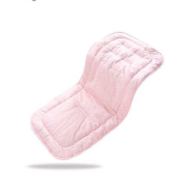 Pink quilted cotton stroller cushion for breathable seat comfort during pram walks and shopping trips.