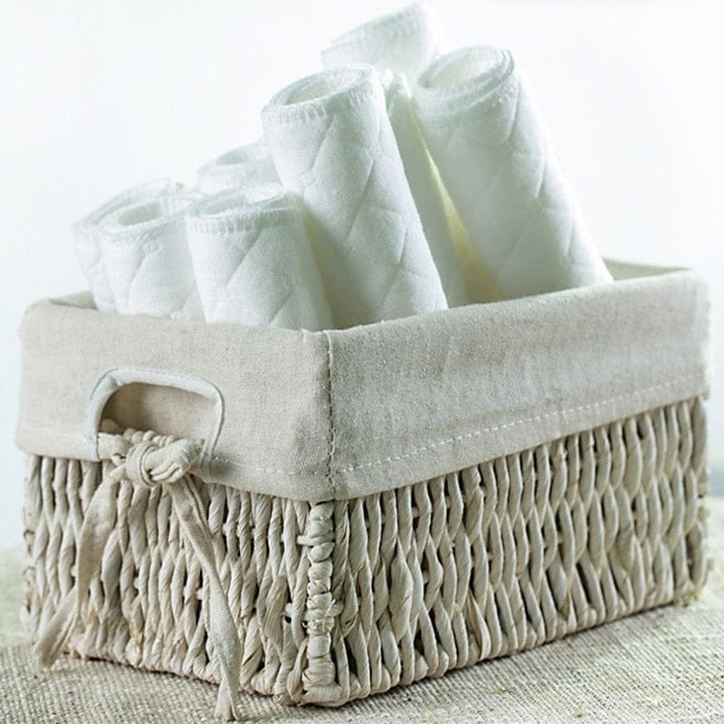 Cotton washable baby nappy folded and laundry ready for repeat use in an eco-friendly nappy routine.