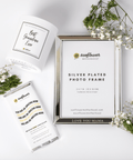 Silver-plated photo frame with 'Sunflower Motherhood' branding.