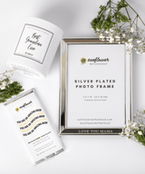 Silver-plated photo frame with 'Sunflower Motherhood' branding.