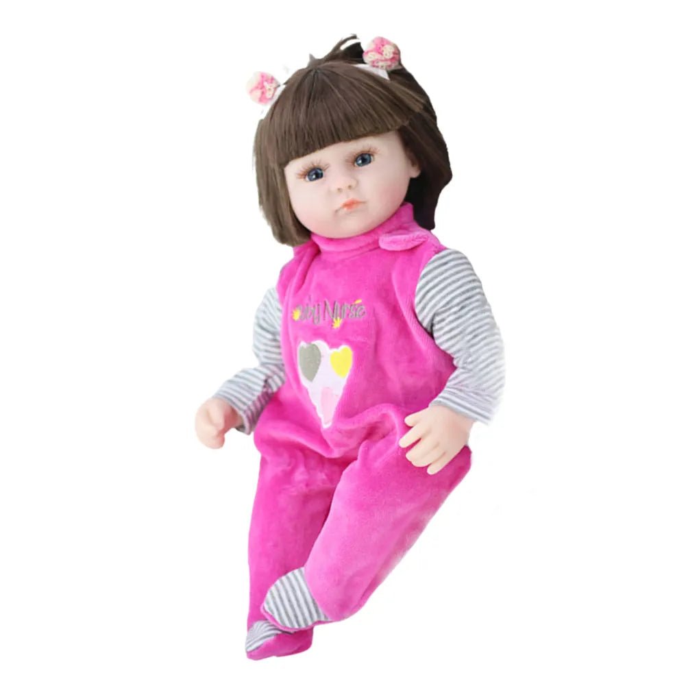 Doll wearing a pink outfit with a heart design on a white background