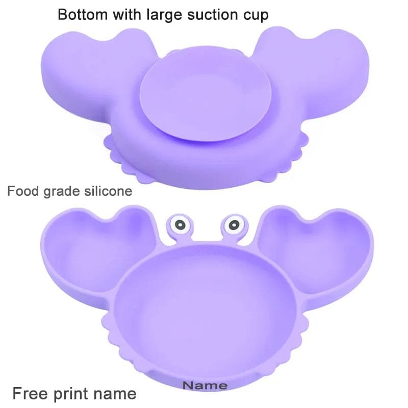 Strong silicone suction base on the purple crab plate, gripping the highchair tray to stop spills and throwing.