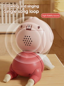 Back of a crawling baby doll showing the speaker holes and a single song loop callout