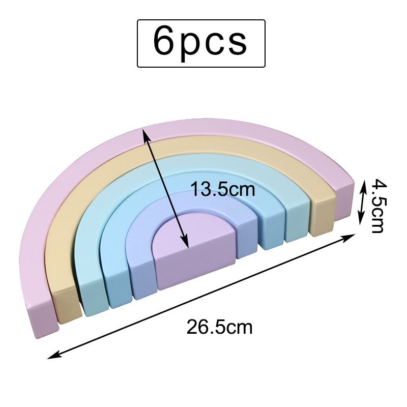 Set of six colorful wooden rainbow-shaped blocks with measurements.