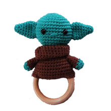 Crochet Alien Character Rattle and Teether plush toy with wooden ring for sensory development and tactile play.