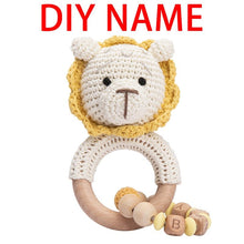 Crochet Bunny Rattle and Teether plush toy with wooden ring for grasping practice and early motor skill development.