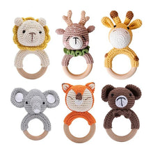 Crochet Bunny Rattle and Teether plush toy set with wooden ring for teething relief and sensory play.