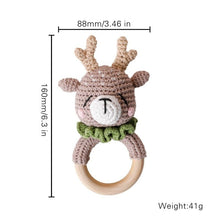 Crochet Deer Rattle and Teether plush toy with wooden ring for baby shower gifting and keepsake.