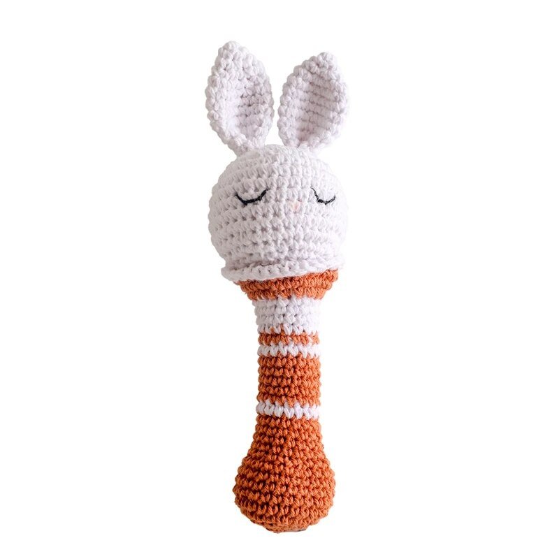 Detail of the crochet fox rattle wrist band that keeps the teething toy close during play and outings.