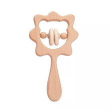 Crochet Lion Rattle and Teether plush toy with wooden ring close-up for baby shower gifting and keepsake.