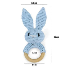 Crochet rabbit rattle teether bracelet for babies to cuddle and chew during pram rides and playtime.
