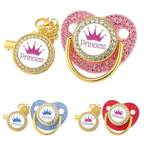 Luxury Crown Pacifier & Clip Set, decorative pacifiers with Prince and Princess text and crowns, in gold, pink, blue, and red, for newborn soothing and daily comfort.