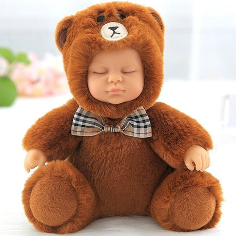 Baby in a brown teddy bear costume with a checkered bow tie.