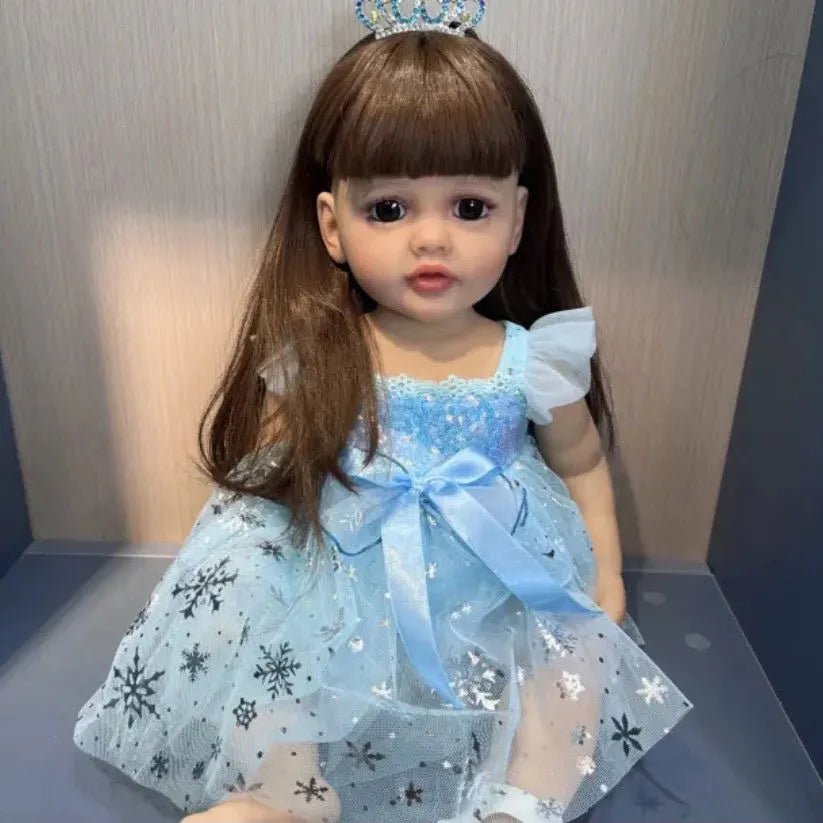 Curly hair silicone Reborn Doll with waterproof body in a blue snowflake tiara dress for princess dress-up play.