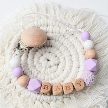 Variant nine of the custom name baby soother holder and teether for keeping dummies handy during outings.