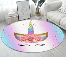 Cute 3D unicorn round kids area rug used as a non-slip floor mat in a lounge for safe crawling and playtime.