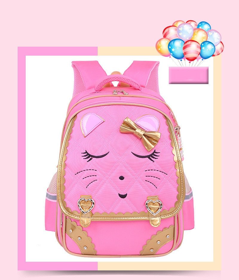Pink backpack with a cartoon face and balloons.