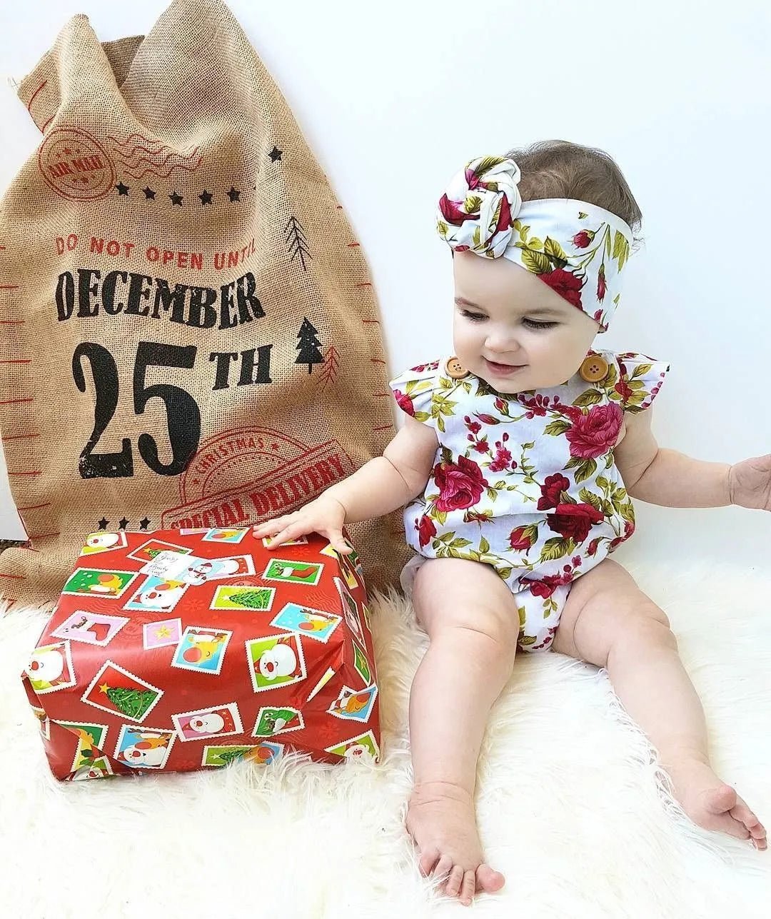 Baby in a floral outfit