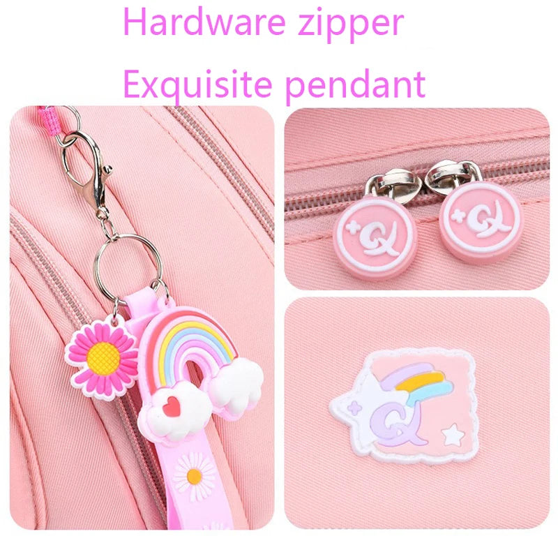 Pink zipper charm with rainbow, flower, and cloud design.
