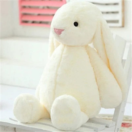 White plush bunny toy.