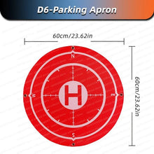 Red drone landing pad with markings and dimensions for safe D6 takeoffs and landings outdoors.