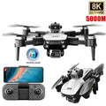 Drone with camera and remote control on a white background