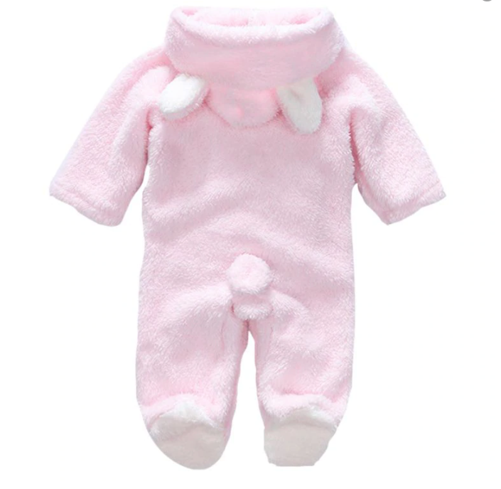 Pink baby snowsuit with white accents on a white background