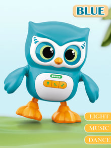 Teal blue owl toy labeled blue with light, music and dance tags