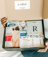 Open box containing products with visible branding