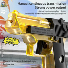 Water blaster toy in gold and black, close-up of manual pump and power output spec label.