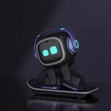 Black desktop robot pet toy with glowing eyes and headphones standing on a skateboard-style base