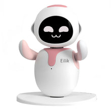 Close-up of a pink and white desktop robot pet with a black screen face and smiling eyes on a round base
