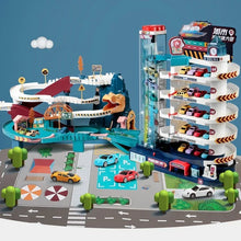 Dino parking garage and race track city layout featuring multiple vehicles for toddler play.
