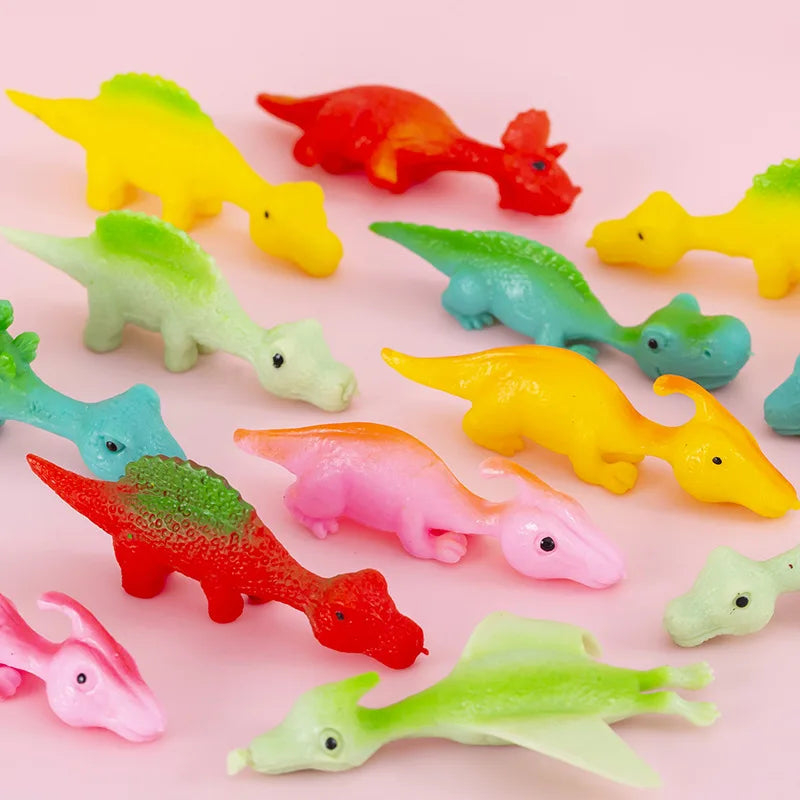Colorful plastic dinosaur toys.