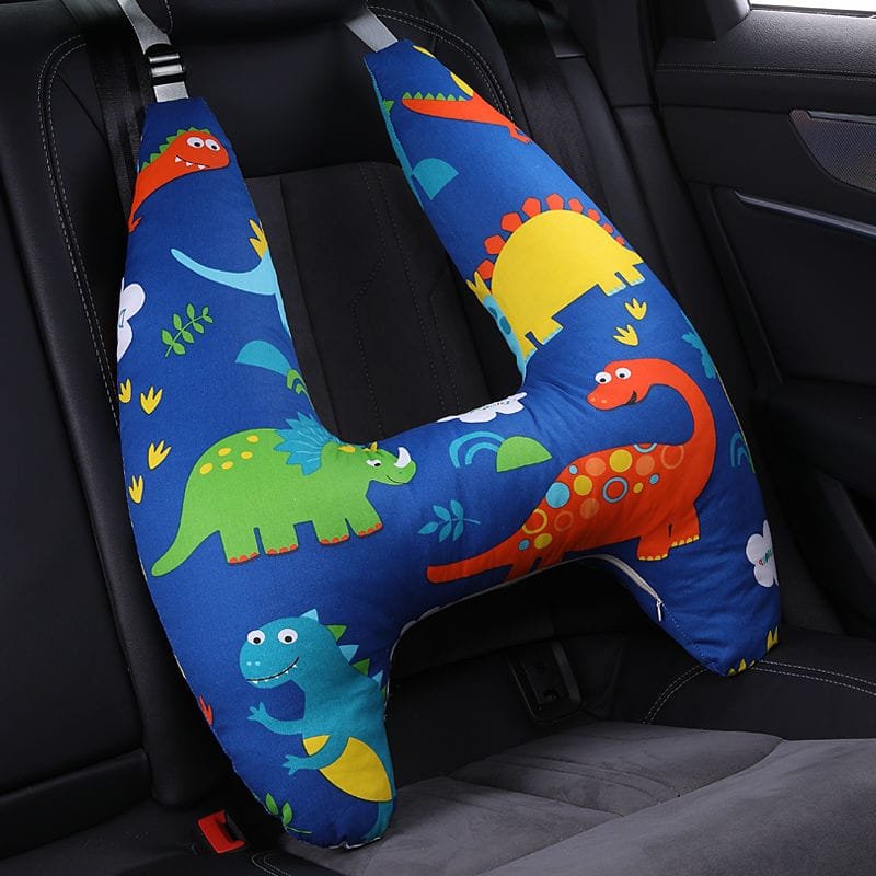 U-Shape Kids Travel Pillow in dinosaur print for cushioned neck support during car seat naps and school runs.