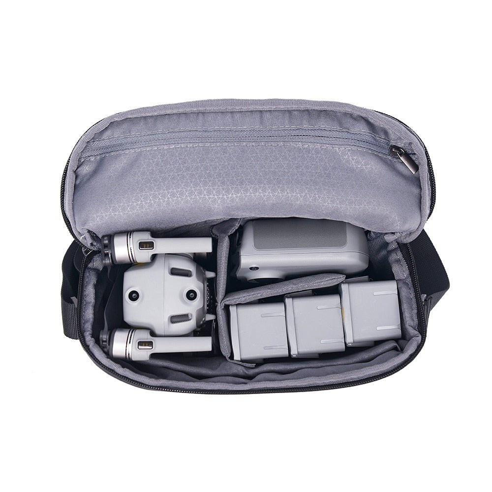 Gray bag with electronic devices inside.