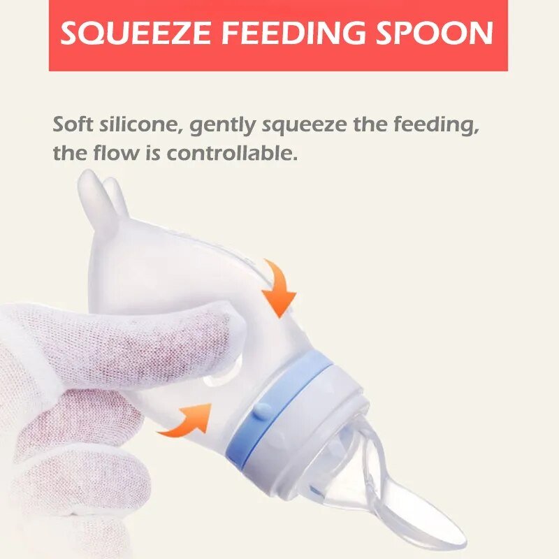 Dolphin silicone squeeze feeding spoon for baby rice cereal and soft food feeding at mealtime.