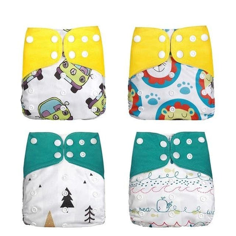 Four colorful baby diapers with cartoon designs 