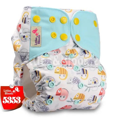 Patterned baby diaper with colorful design, featuring the brand 'Littles & Bloomz'.