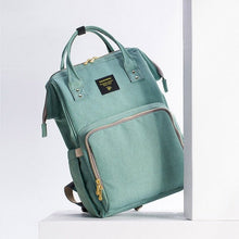 Green backpack.